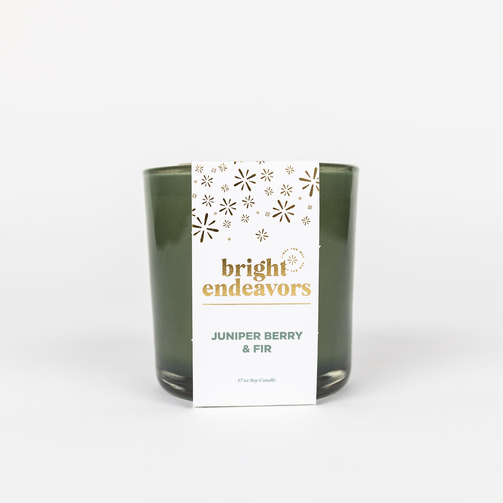 Juniper berry fir candle in a green vessel 
