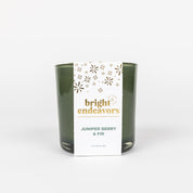 Juniper berry fir candle in a green vessel 